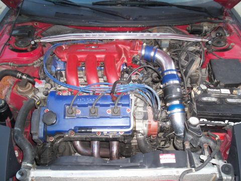 1993 Ford Probe - Engine bay view showing aftermarket modifications and engine components.