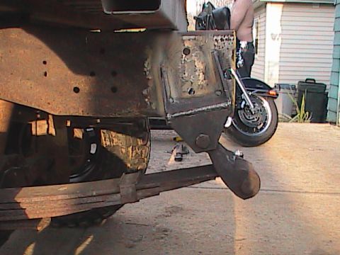 1980 Dodge Magnum - Focus on the undercarriage of a truck, showing the frame and suspension components.