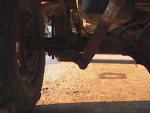 1980 Dodge Magnum - Undercarriage view showing rear axle and suspension parts of a vehicle.