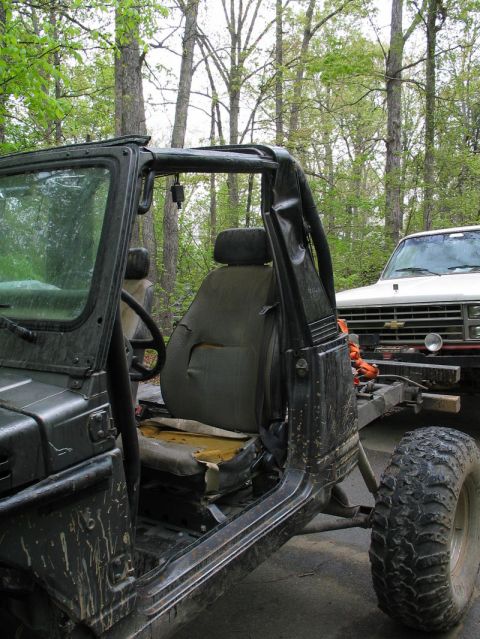 1990 Ford Bronco - Dude left this huge dent with his head when he flopped it. Ouch.