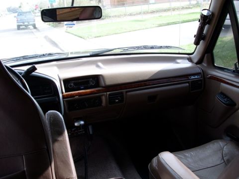 1996 Ford Bronco - Interior view of a 1992 Ford Bronco, showing the dashboard, seats, and floor shifter.