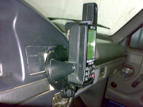 1995 Ford F-150 - A Magellan GPS unit is mounted on the dashboard of a vehicle.