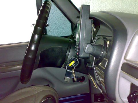 1995 Ford F-150 - Interior view of a 1995 Ford F-150, a GPS device mounted on the dashboard.