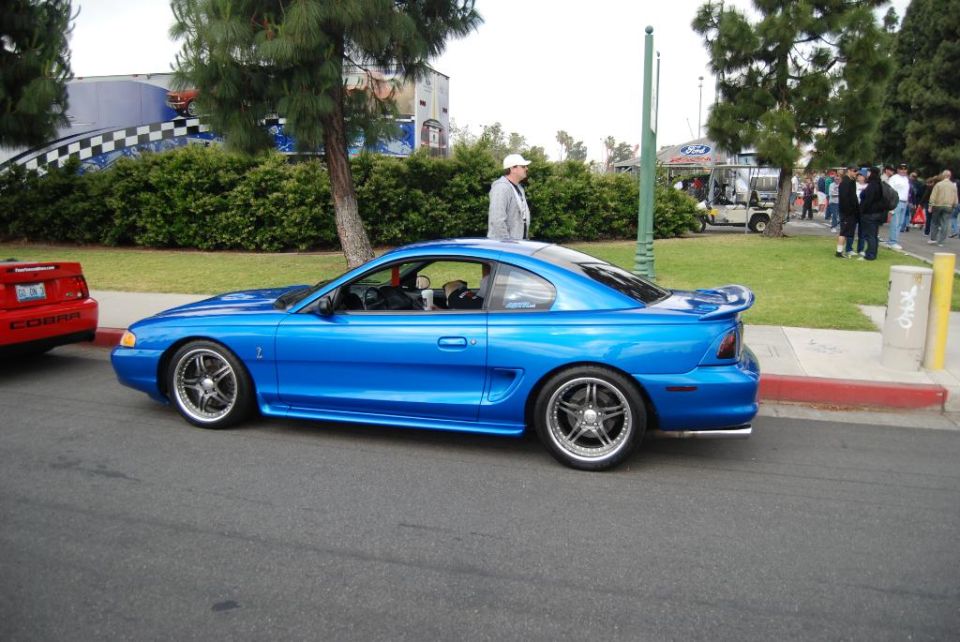 Blue 1996 Ford Mustang Cobra coupe, side view