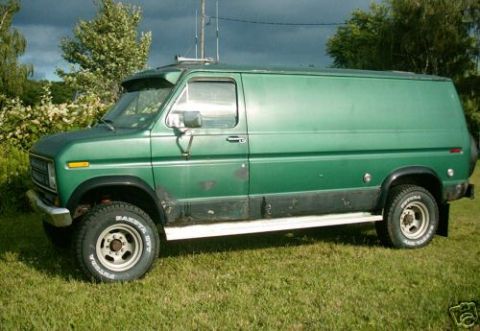 1978 Ford E250 - This 1978 Ford E250 van features an off-road suspension and tires, giving it a appearance.