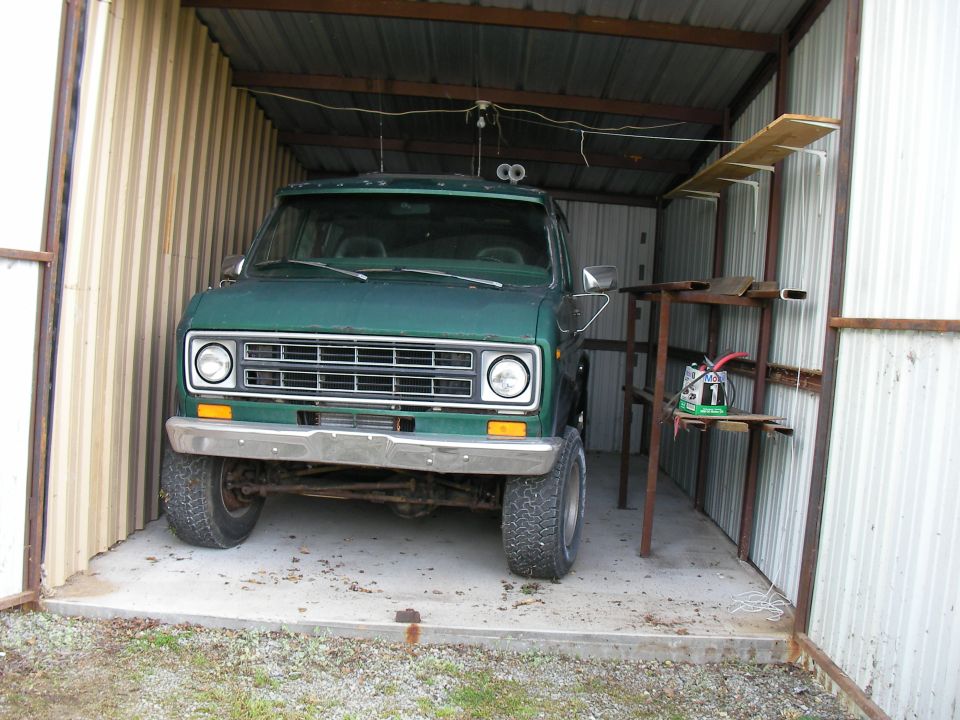 1978 Ford E250 van front view parked in a shed
