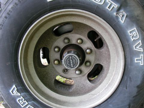 1978 Ford E250 - A "4x4" hubcap is visible on the wheel of a vehicle.