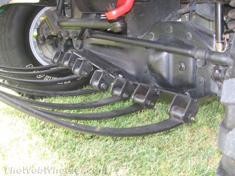 1968 Ford Mustang - Close-up view of a vehicle's leaf spring suspension system.