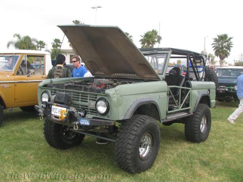 1968 Ford Mustang - Modified 1968 Ford Bronco on display, with its hood raised to reveal the engine compartment.