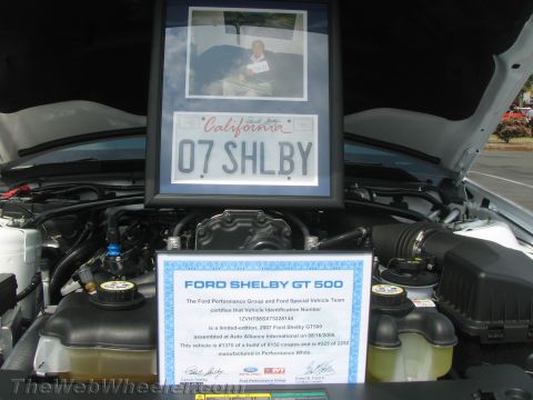 1968 Ford Mustang - 2007 Ford Shelby GT500 engine bay display with framed memorabilia and certificate.