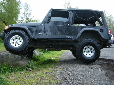 2005 Jeep Wrangler - A little air under the back tire. Hitting the body on the other side causing this side to come up.