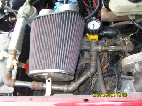 1989 Ford Bronco - Custom engine bay modification an air intake and pressure gauge.