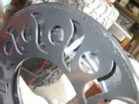 1990 Ford Bronco - Just pull the valve stem through the hole with a little prying action.