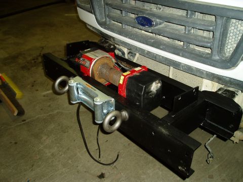 2000 Ford E350 - Custom bumper mount with a winch installed on the front of a Ford van.