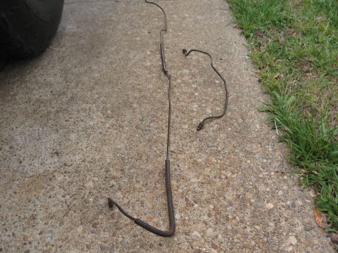 1968 Shelby GT500 - Brake lines are shown on a concrete surface next to grass.