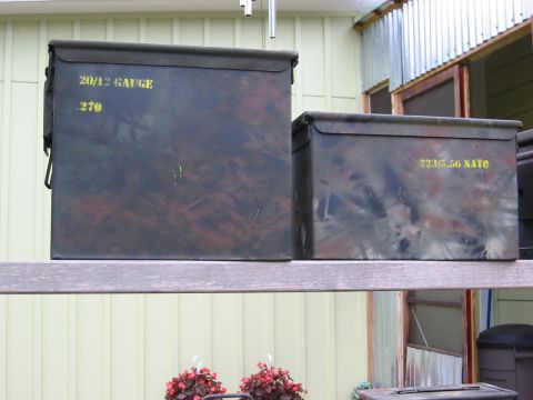 1996 Ford Bronco - Two camouflage-painted ammo cans are displayed on a shelf, one marked for 20/12 gauge and 270 rounds, the other for 223/5.56 NATO.