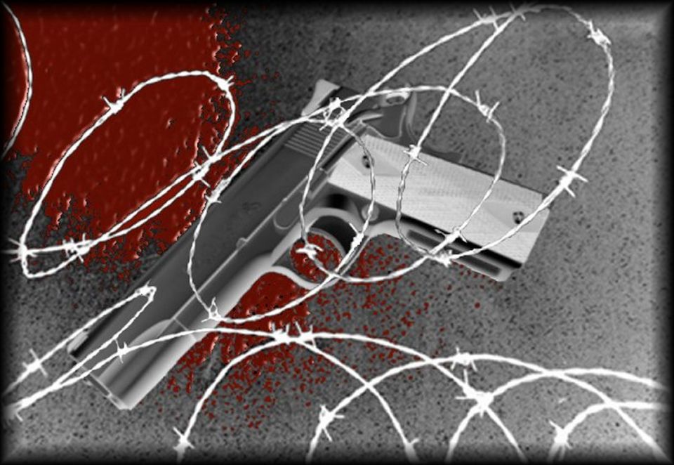 pistol tangled in barbed wire with blood splatters