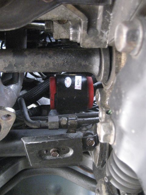 1993 Ford Probe - Close-up of an engine component with a label indicating part number 'L 8456'.