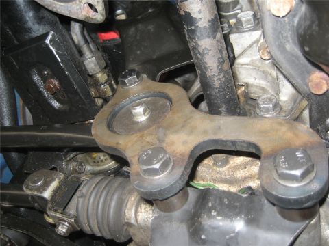 1993 Ford Probe - Underside view of a vehicle's mechanical component, showing a bracket and associated parts.
