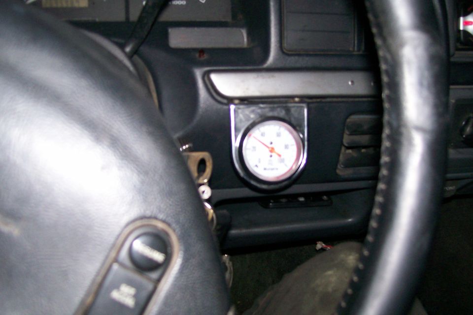 Gauge installed.  Can't say I'm particularly fond of this gauge, but it came on the parts bronco, so I figured I use it, and now that the line is ran, I can replace pretty easy anytime I want.