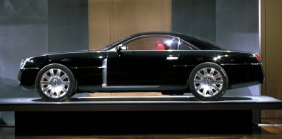 2004 Lincoln MK 9 - The 2004 Lincoln MK 9 concept coupe is shown from its side profile.