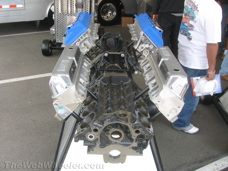 Engine block with chrome valve covers and blue intake manifolds