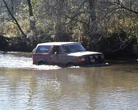 1988 Ford Bronco - This 1988 Ford Bronco is navigating through a water crossing.