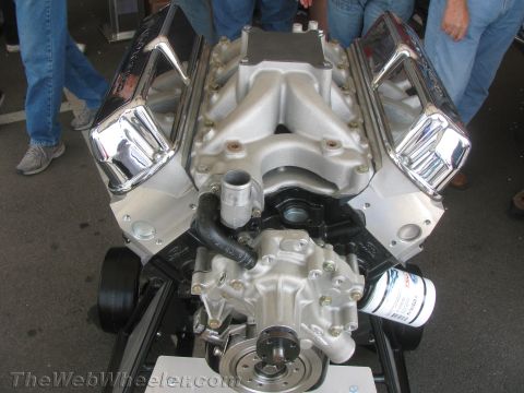 1968 Ford Mustang - This V8 engine features chrome valve covers and an aluminum intake manifold, with an oil filter attached.