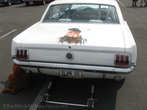 1968 Ford Mustang - White 1966 Ford Mustang rear view, custom airbrush art and a personalized license plate.