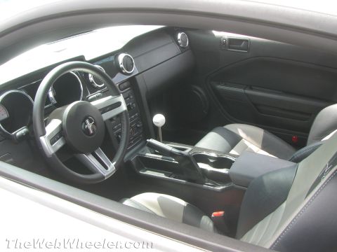 1968 Ford Mustang - Interior of a modern Ford Mustang, showing the dashboard, steering wheel, and seats.