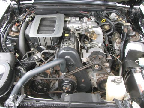 1968 Ford Mustang - Engine bay view of a Ford Turbo Fuel Injection engine, likely from the 1980s.