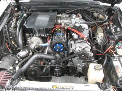 1968 Ford Mustang - Close-up view of a Ford Turbo engine bay, an intercooler and various engine components.