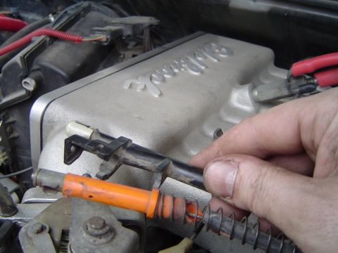 1989 Ford Bronco - Unhook the tranny kickdown from the cable