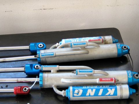 1996 Ford Bronco - King Off-Road shocks are visible, with labels indicating compression and rebound adjustments.