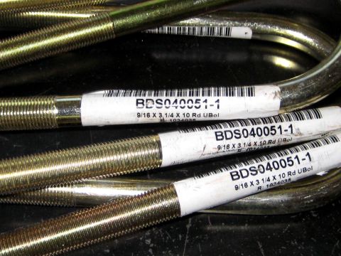 1996 Ford Bronco - Close-up of multiple U-bolts, each with a label indicating part number and specifications.