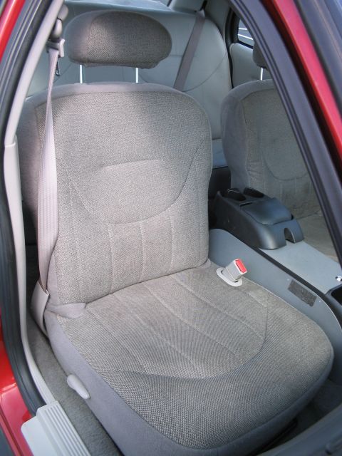2001 Ford Crown Victoria - Interior view of a 2001 Ford Crown Victoria, highlighting the front passenger seat and console area.
