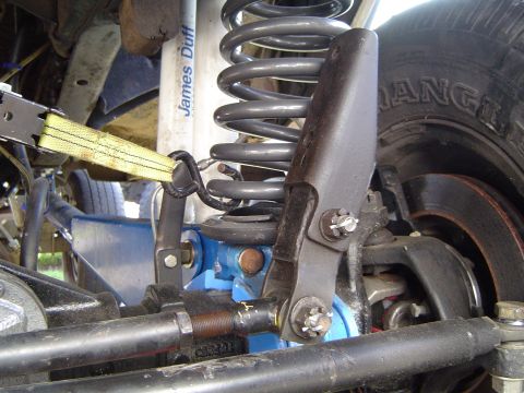 1978 Ford Bronco - Unbolted track bar bracket from the frame, notice how far the adj track bar id extended out