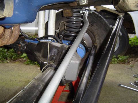 1978 Ford Bronco - This image shows the underside of a vehicle, focusing on the rear axle and suspension system with various aftermarket components.