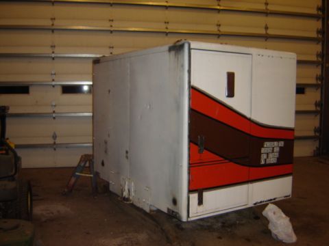 1992 Ford Bronco - Utility box with visible text on its side, parked indoors.