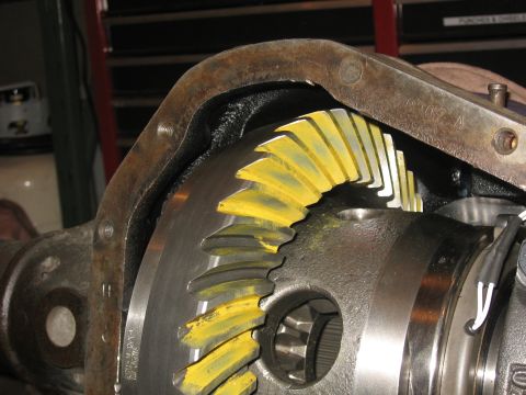 1990 Ford F-250 - The internal gears of a differential are visible, marked with yellow paint.
