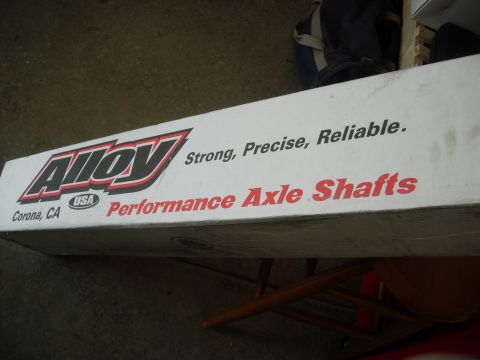 1995 Ford Bronco - A box labeled 'Alloy USA Performance Axle Shafts' is shown, with text indicating it's from Corona, CA.