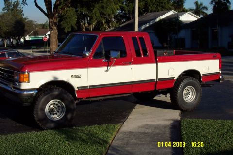 1989 Ford F-150 - This is it at the moment. Has a 3 inch Rancho Body Lift with 35 x 12.5 x 15 tires. Holley Headers with Dual Exhaust and Dynamax Mufflers.