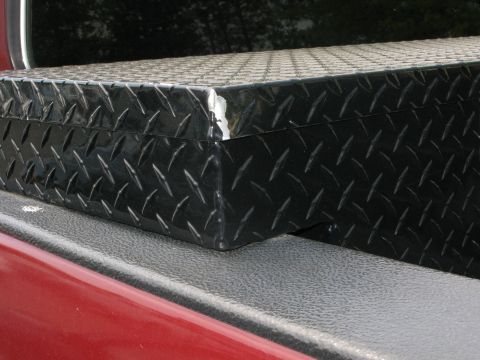 1991 Ford F-150 - A black diamond plate toolbox is visible on the bed of a red truck, with a Supermotors.net watermark at the bottom right.