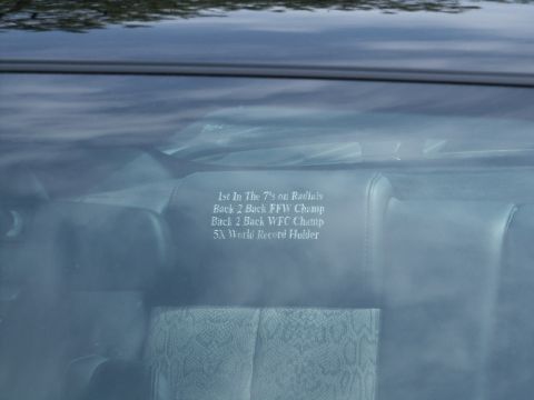 2001 Mercury Grand Marquis - Custom text on a car's headrest details its racing achievements.
