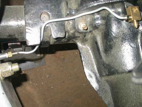 1990 Ford Bronco - Ran a 3/16" hard line to the splitter block where the single brake line drop is going to come down. I'll run the passenger side line after…