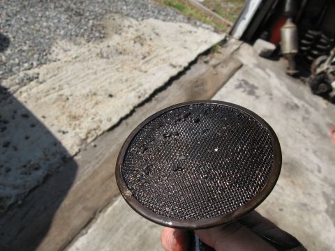 1991 Mitsubishi 3000GT - spun bearing trash from #2 rod bearing stuck in the sump pickup tube screen