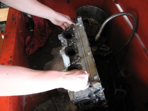 1991 Mitsubishi 3000GT - mark cleaning the cylinder head