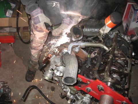 1991 Mitsubishi 3000GT - my friend welding up a cracked weld on the turbo manifold