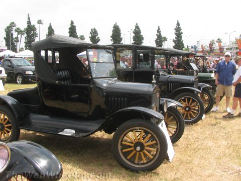 1968 Ford Mustang - Photograph of vintage Ford Model T cars at a car show, not a technical document.