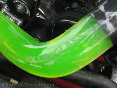 1968 Ford Mustang - A bright green hose with "KILLERGLASS" branding is visible in the engine bay.